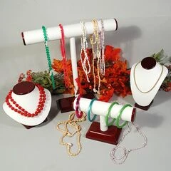 JEWELRY DISPLAYS IN ROSEWOOD AND LEATHERETTE
