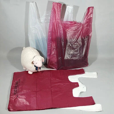 T-Shirt Bags- 23" x 10" x 36"- 20 mic. 250/case.**WHITE ONLY**