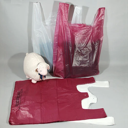 T-Shirt Bags- 23" x 10" x 36"- 20 mic. 250/case.**WHITE ONLY**